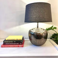 Apollo Table Lamp with antique silver finish and hammered aluminium base