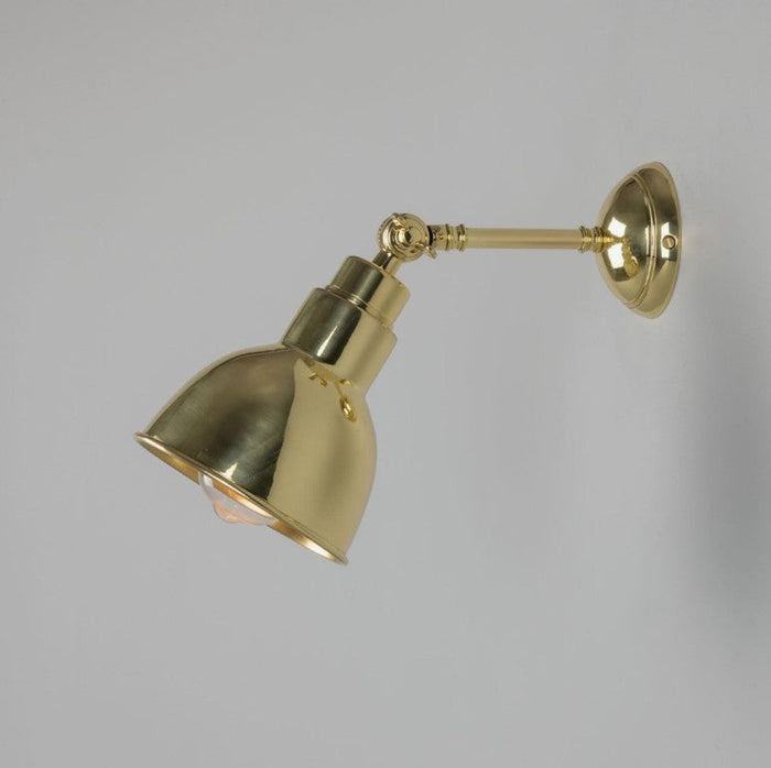 Moorlea brass adjustable wall light with vintage industrial design and flexible arm for focused indoor lighting