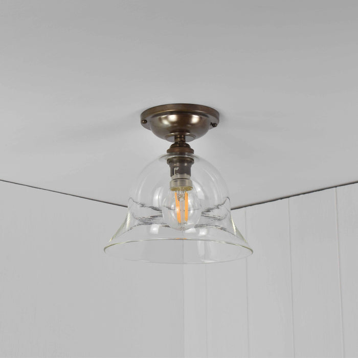 Bodium small clear glass shade flush ceiling light with sleek modern design and handcrafted UK glass shade