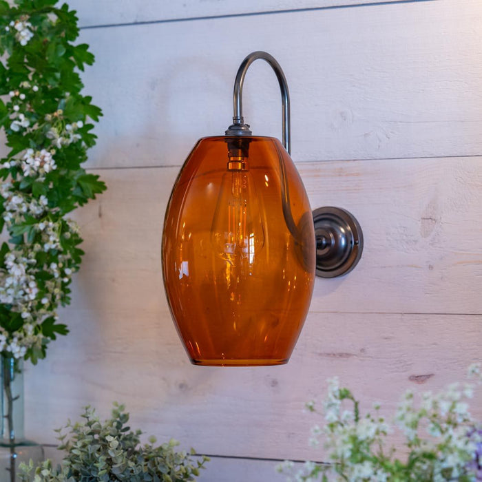 Camber Large Amber Glass Wall Light with elegant amber glass shade and long swan neck arm in bronze finish