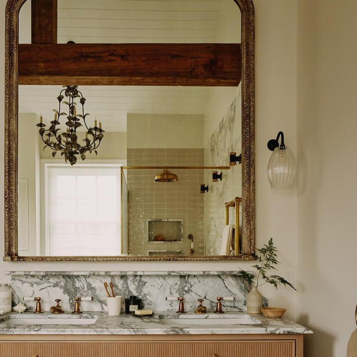 camber ribbed bathroom wall light in an elegant bathroom