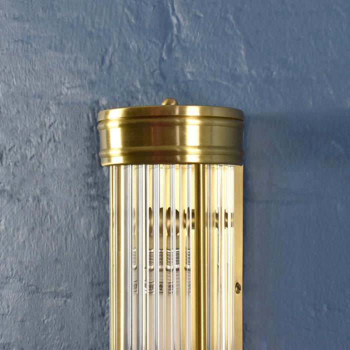Chester Glass Rodded Bathroom Wall Light in satin brass with sleek rodded glass and IP44 moisture resistance for elegant bathroom illumination