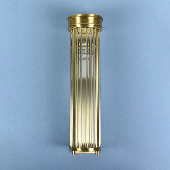 Chester Glass Rodded Bathroom Wall Light in satin brass with rodded glass design providing ambient moisture-resistant lighting for bathrooms