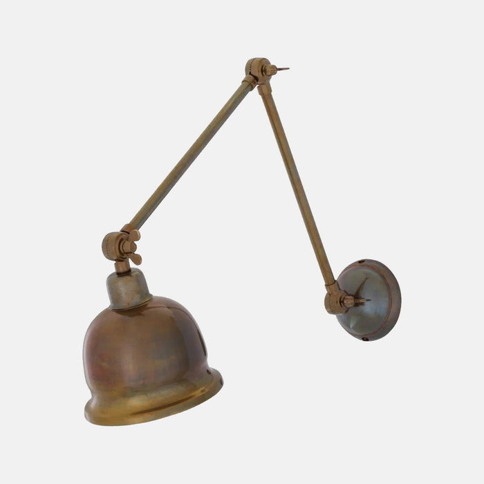 Dale Adjustable Wall Light with three pivot points highlighting artwork in a traditional style