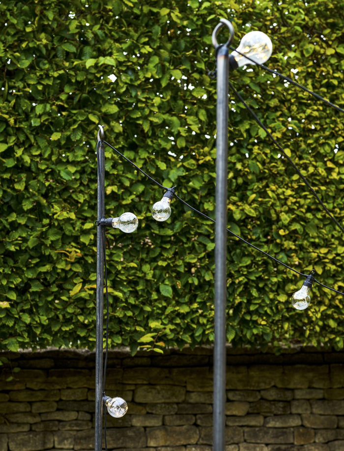 Sturdy steel festoon poles with bull horn design for outdoor garden lighting setup