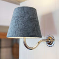 Finberry Blue Velvet fabric shade wall light with swan neck design and warm glow