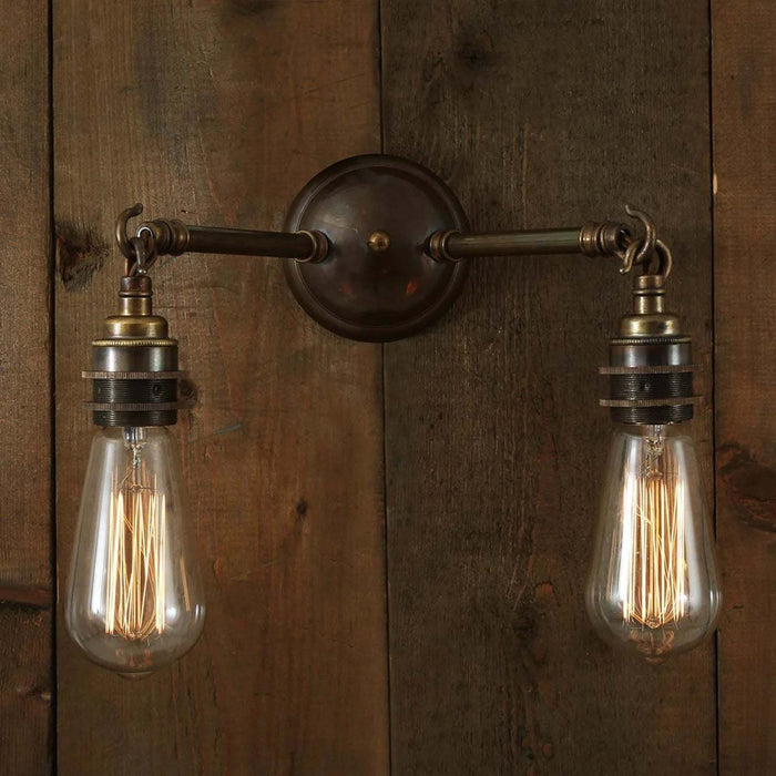 Kempton Double Wall Light with industrial double-arm design and vintage-style cage