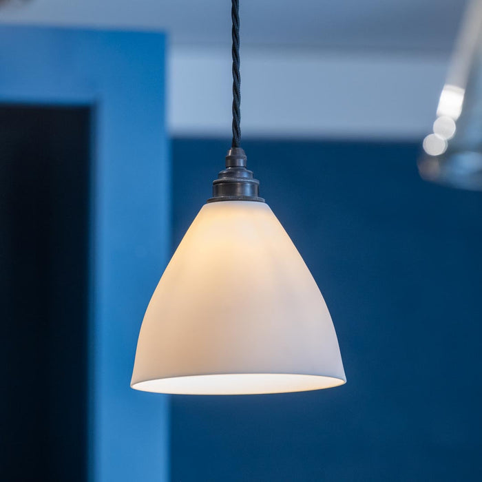 Langton Ceramic Shade Pendant Light with handcrafted ceramic lampshade and warm ambient glow