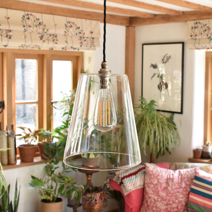 Newbury large clear glass shade pendant light with adjustable cord and warm glow