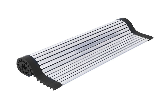 Roll-up dish drying rack part-rolled on a white background