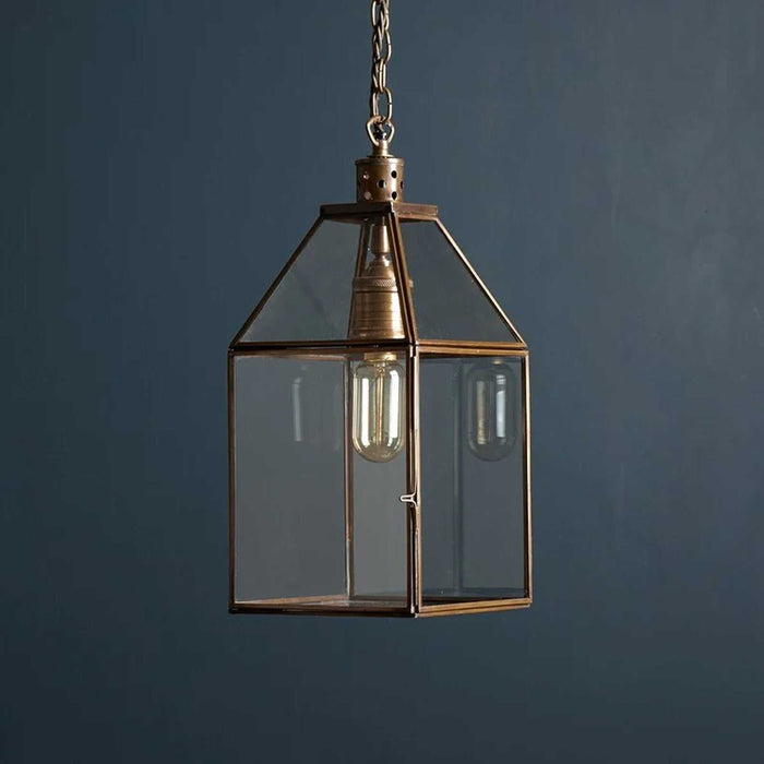 Pooky Carrington Lantern medium pendant light with antique brass frame and glass shade