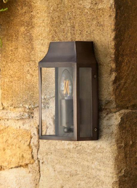 Pooky Crail Outdoor Wall Light solid brass classic lantern style on exterior wall