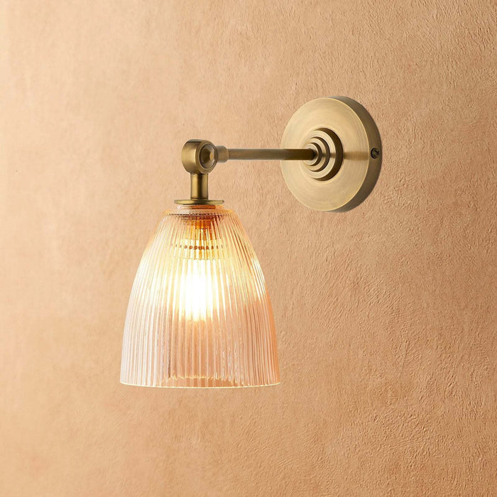Tiny Qilin Bathroom Wall Light with prismatic glass shade and antique silver finish mounted on wall