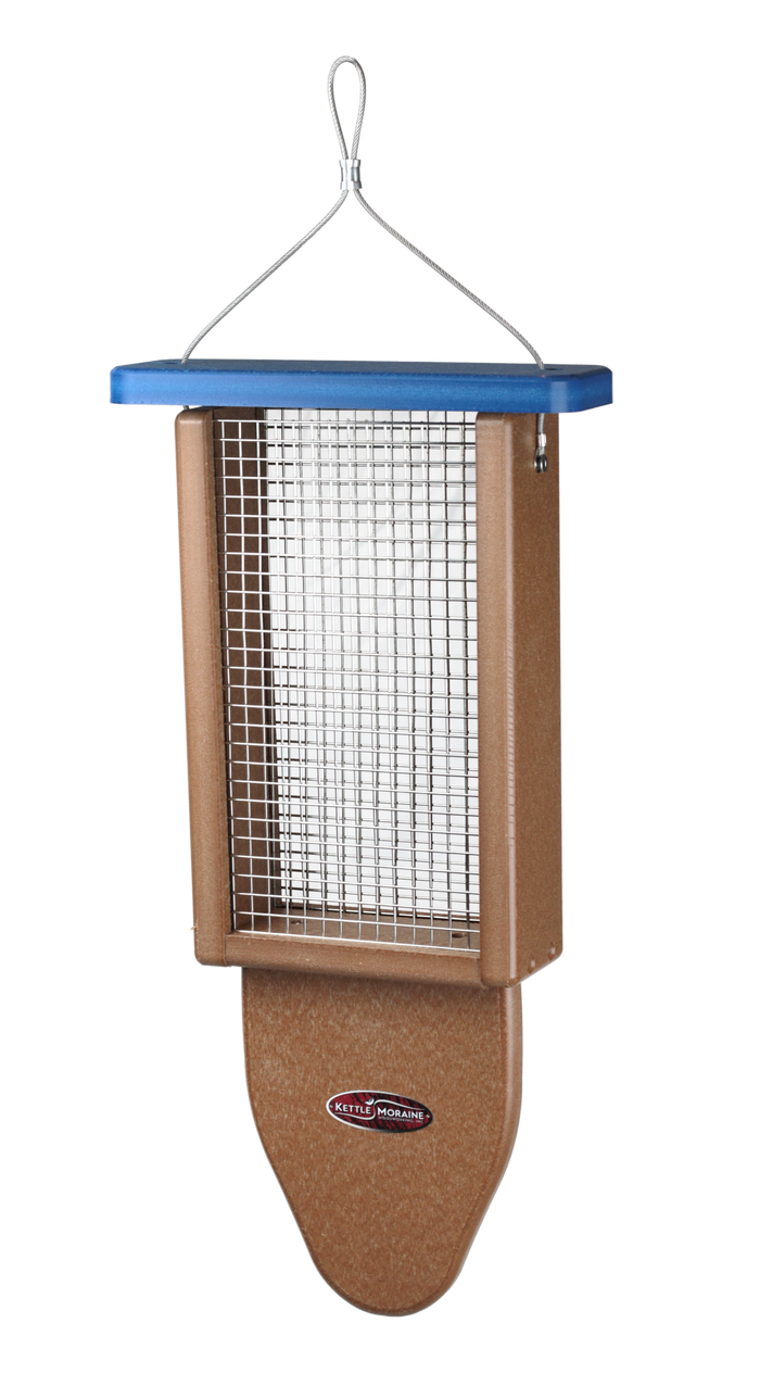 A brown bird feeder with a blue top made of recycled plastic. Has a wire mesh side. Feeder has a hanging cable and rounded tail prop.
