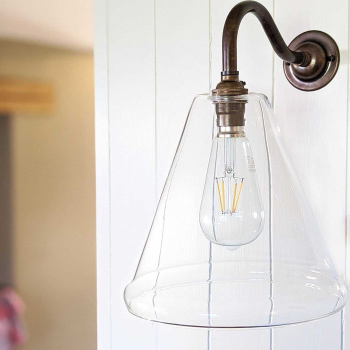 Rye Clear Glass Wall Light with medium handblown glass shade and swan neck finish