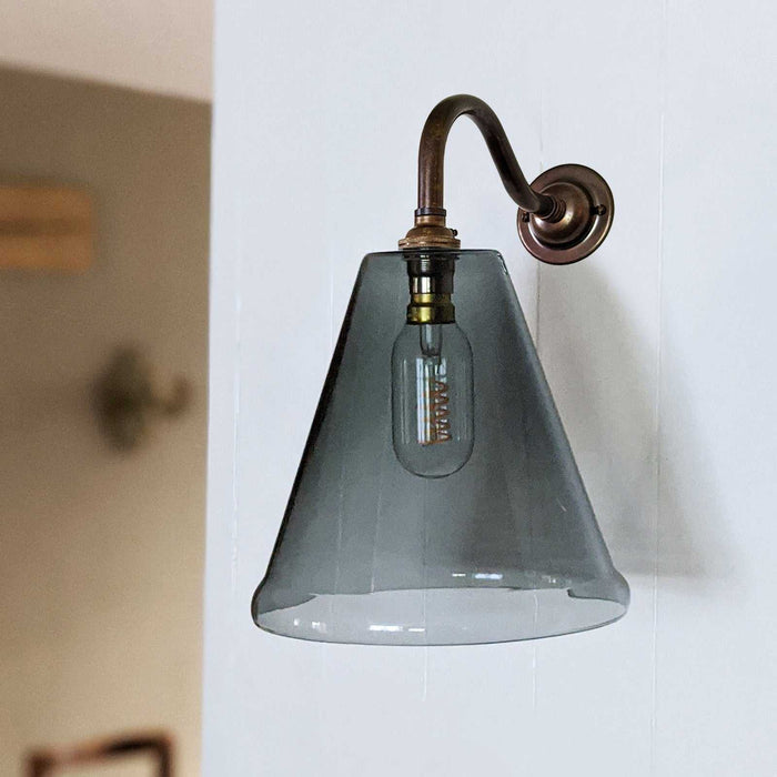 Rye Smoked Glass Wall Light with handcrafted medium smoked glass shade and warm ambient glow