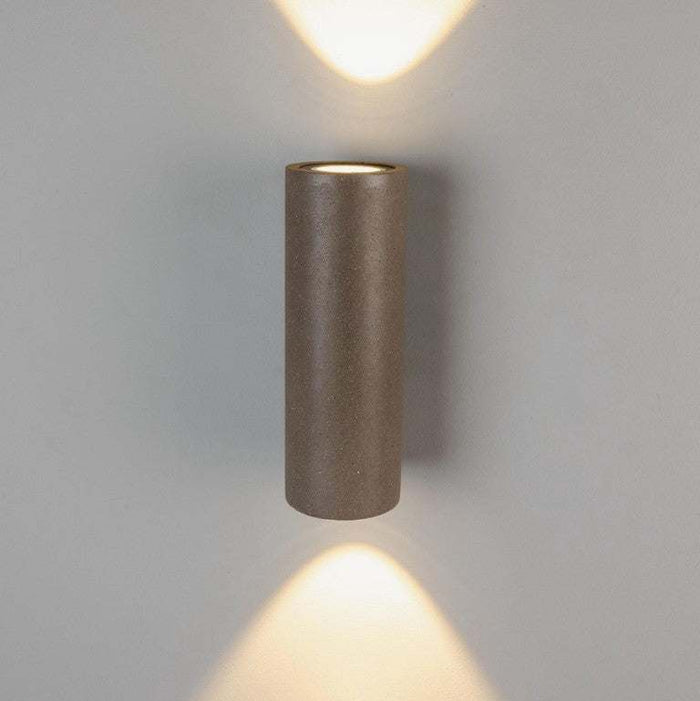 Simple cylindrical concrete outdoor wall light with up and down LED illumination, IP65 rated