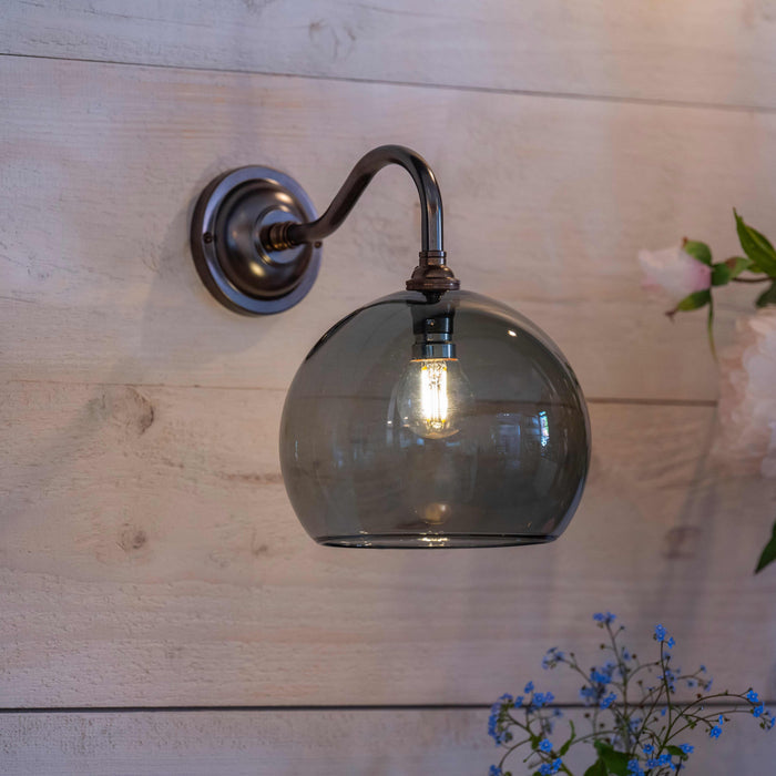 Soho Smoked Glass Wall Light with medium smoked glass shade and minimalist design in antique brass finish