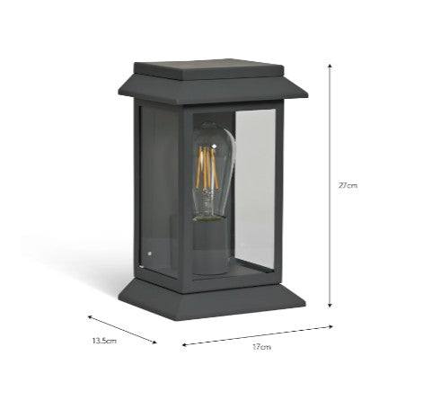 Stourton Carbon Steel Outdoor Wall Light with lantern design and clear glass panels in matte carbon finish on exterior wall