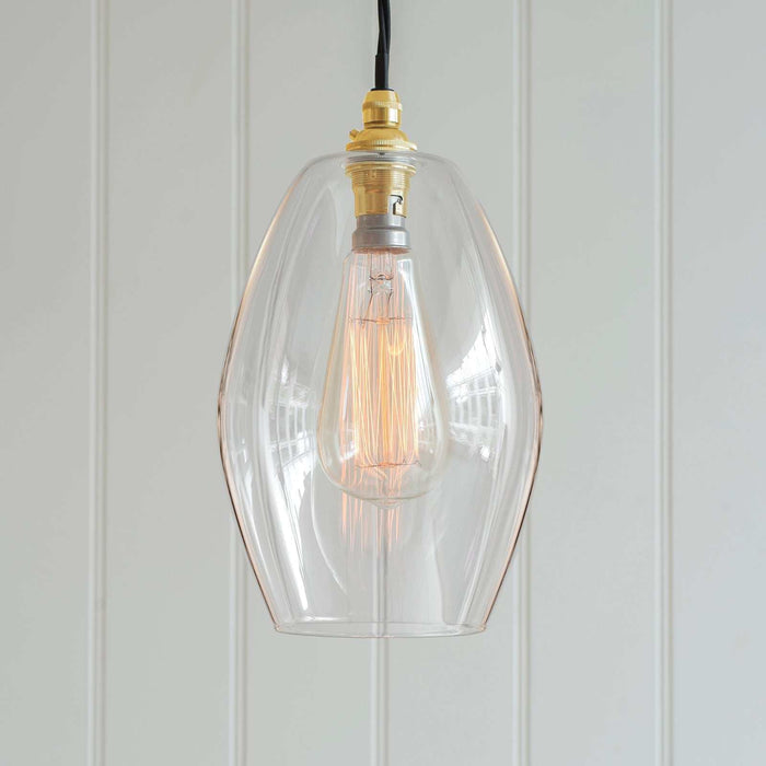 Wonky Camber Clear Glass Pendant Light medium fluted design with artisan imperfections and warm ambient glow
