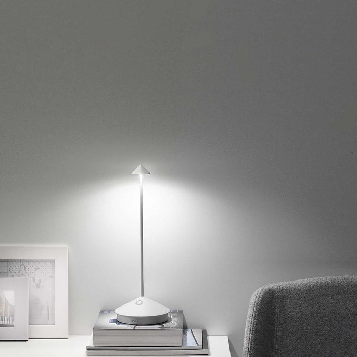 Zafferano Pina Pro rechargeable white table lamp with minimalist modern design and touch controls
