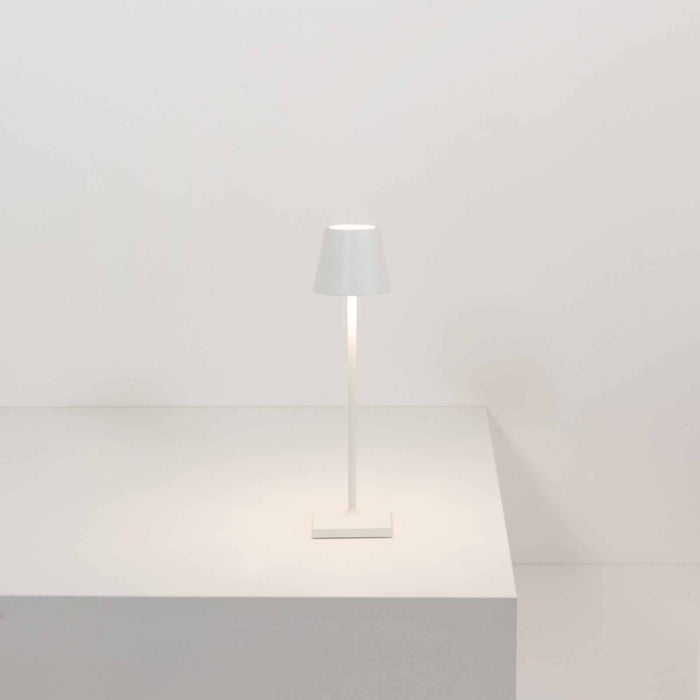 Sleek white Zafferano Poldina Micro rechargeable LED table lamp with touch brightness control