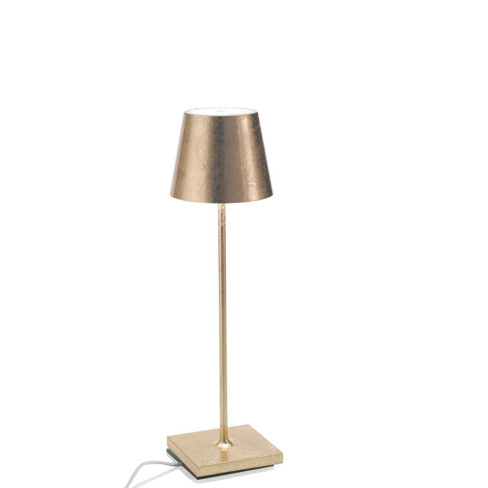 Zafferano Poldina Pro rechargeable gold table lamp with elegant design and portable lighting for indoor and outdoor use